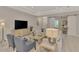 Inviting living room showcases a comfortable sectional sofa, stylish furnishings, and decor at 12404 Destin Loop, Venice, FL 34293