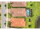 Aerial view of home with screened pool and surrounding landscaping at 13092 Rinella St, Venice, FL 34293
