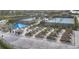 Well-maintained community garden plots and shaded seating area for relaxation and socializing at 13092 Rinella St, Venice, FL 34293