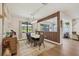 Dining room featuring a neutral color palette, modern decor, and a view of the backyard at 13092 Rinella St, Venice, FL 34293