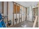 Under Construction room with visible framing, wiring, and plumbing, waiting for your personal design touch at 1350 Holiday Dr, Englewood, FL 34223