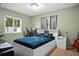 The bedroom features gaming set up and good natural lighting at 13608 Westshire Dr, Tampa, FL 33618