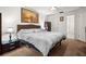 Inviting bedroom with a queen bed, complemented by stylish bedside tables and a well-lit ambiance at 13608 Westshire Dr, Tampa, FL 33618