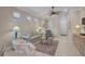 Open concept living space featuring tile flooring and neutral colors at 13841 Campoleone St, Venice, FL 34293
