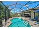 Inviting pool area with brick paving, screened enclosure, and seamless access to the covered lanai for outdoor fun at 13841 Campoleone St, Venice, FL 34293