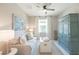 Comfortable bedroom with natural light, neutral tones, and tasteful furnishings at 13871 Miranese St, Venice, FL 34293