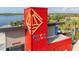 Striking Downtown entrance with colorful architecture, signage and water view at 13871 Miranese St, Venice, FL 34293