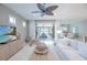 Bright living room showcasing open layout leading to the outdoor entertainment area at 13871 Miranese St, Venice, FL 34293