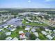 Scenic aerial view of the neighborhood, near shopping and waterways, offering a unique coastal lifestyle at 16 Oakwood N Dr # 16, Englewood, FL 34223
