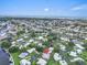 Beautiful aerial perspective of the coastal community with waterfront homes and scenic views at 16 Oakwood N Dr # 16, Englewood, FL 34223