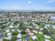Scenic aerial view of the waterfront neighborhood showcasing the tranquil waterways and residential charm at 16 Oakwood N Dr # 16, Englewood, FL 34223