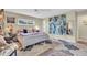 Comfortable bedroom featuring a cozy bed, stylish decor, and a relaxing ambiance at 16 Oakwood N Dr # 16, Englewood, FL 34223