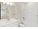 Clean bathroom featuring a tub-shower combo and a bright vanity at 1607 Laurel Brook Ln, Port Charlotte, FL 33953