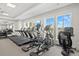 Fully equipped gym offers treadmills, ellipticals, and more for a complete fitness routine at 1607 Laurel Brook Ln, Port Charlotte, FL 33953