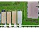 Aerial view of houses, showcasing manicured lawns and well-maintained roofing at 17873 Grand Prosperity Dr, Venice, FL 34293