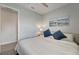 Cozy bedroom featuring stylish decor, neutral walls, and modern wood-look flooring at 17873 Grand Prosperity Dr, Venice, FL 34293