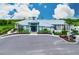 Community clubhouse featuring modern architectural design, perfect for gatherings and events at 17873 Grand Prosperity Dr, Venice, FL 34293
