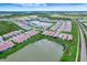 Aerial community view of homes and ponds in a scenic Florida neighborhood at 17873 Grand Prosperity Dr, Venice, FL 34293