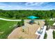 Colorful community playground offering a safe and fun recreational space with slides and swings at 17873 Grand Prosperity Dr, Venice, FL 34293