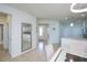 Entryway with mirror and view of the Kitchen at 19269 Serafina St, Venice, FL 34293