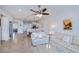 Spacious living room with open floor plan and tile flooring at 19269 Serafina St, Venice, FL 34293