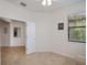 Bright office space with natural light and neutral tiling, offering a calm work environment at 19269 Serafina St, Venice, FL 34293