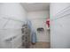 Spacious walk-in closet with shelving at 19269 Serafina St, Venice, FL 34293