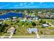 Wide aerial view of the neighborhood and nearby canal system at 20430 Edgewater Dr, Port Charlotte, FL 33952