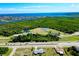 Wide aerial view of a residential community close to conservation area and open water at 20430 Edgewater Dr, Port Charlotte, FL 33952