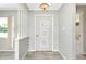 Open foyer featuring tile flooring and decorative accents at 20430 Edgewater Dr, Port Charlotte, FL 33952