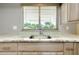 A close up shot of a stainless steel sink with a faucet at 20430 Edgewater Dr, Port Charlotte, FL 33952