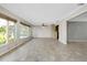 Open-concept living room with abundant natural light and neutral tones at 20430 Edgewater Dr, Port Charlotte, FL 33952