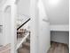 Hallway showing staircase and access to other rooms in the house at 2146 Snapdragon Ln, Venice, FL 34292
