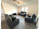 Inviting living room featuring vaulted ceiling, and ceiling fan at 217 Blackburn Blvd, North Port, FL 34287