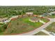 Aerial view of single-Gathering home and large property outlined in red at 2479 Grandview Dr, North Port, FL 34288