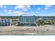 Aerial view showcasing direct beach access for this condo community at 255 The Esplanade N # 106, Venice, FL 34285