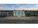 Beachfront condo building with views of the ocean and beach access at 255 The Esplanade N # 106, Venice, FL 34285