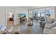 Relaxing living room with beach views, comfortable seating, and easy access to the bedroom at 255 The Esplanade N # 106, Venice, FL 34285