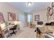 Bedroom with carpet, natural lighting, and neutral walls with decorations at 2944 Oriole Dr, Sarasota, FL 34243