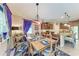 Inviting dining area, displaying stylish decor, and adjacent open concept kitchen at 2944 Oriole Dr, Sarasota, FL 34243