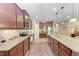 Spacious kitchen featuring granite countertops, stainless steel appliances, and a stylish backsplash at 2944 Oriole Dr, Sarasota, FL 34243
