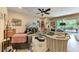 Well-decorated living room featuring stylish furniture, a ceiling fan, and access to an outdoor patio at 2944 Oriole Dr, Sarasota, FL 34243