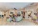 Inviting living room showcasing comfortable seating, tile floors, and a glimpse of a bedroom at 2944 Oriole Dr, Sarasota, FL 34243