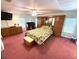 Spacious bedroom with large wardrobe, desk, and comfortable king-size bed at 344 Mariner Dr, North Port, FL 34287