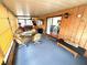 Spacious Florida room offers a seating area and hot tub at 344 Mariner Dr, North Port, FL 34287