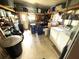 Spacious garage interior with laundry machines and shelving for storage or hobbies at 344 Mariner Dr, North Port, FL 34287