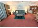 Inviting living room showcasing a comfortable sofa, stylish decor, and ample space for entertaining at 344 Mariner Dr, North Port, FL 34287