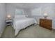 Comfortable bedroom with a window and a neutral color scheme for a serene atmosphere at 346 Roseling Cir, Venice, FL 34293