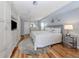 Beautiful main bedroom with wood floors, built-in storage, and plenty of natural light at 346 Roseling Cir, Venice, FL 34293
