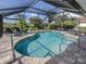 Enjoy this screened-in pool area featuring a tranquil spot for relaxing with lounge chairs at 346 Roseling Cir, Venice, FL 34293